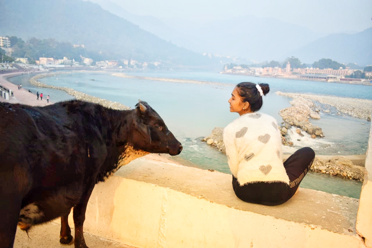 Swathi with a cow