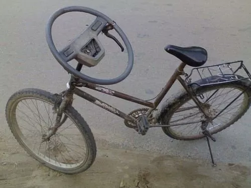 A bicycle with a steering wheel