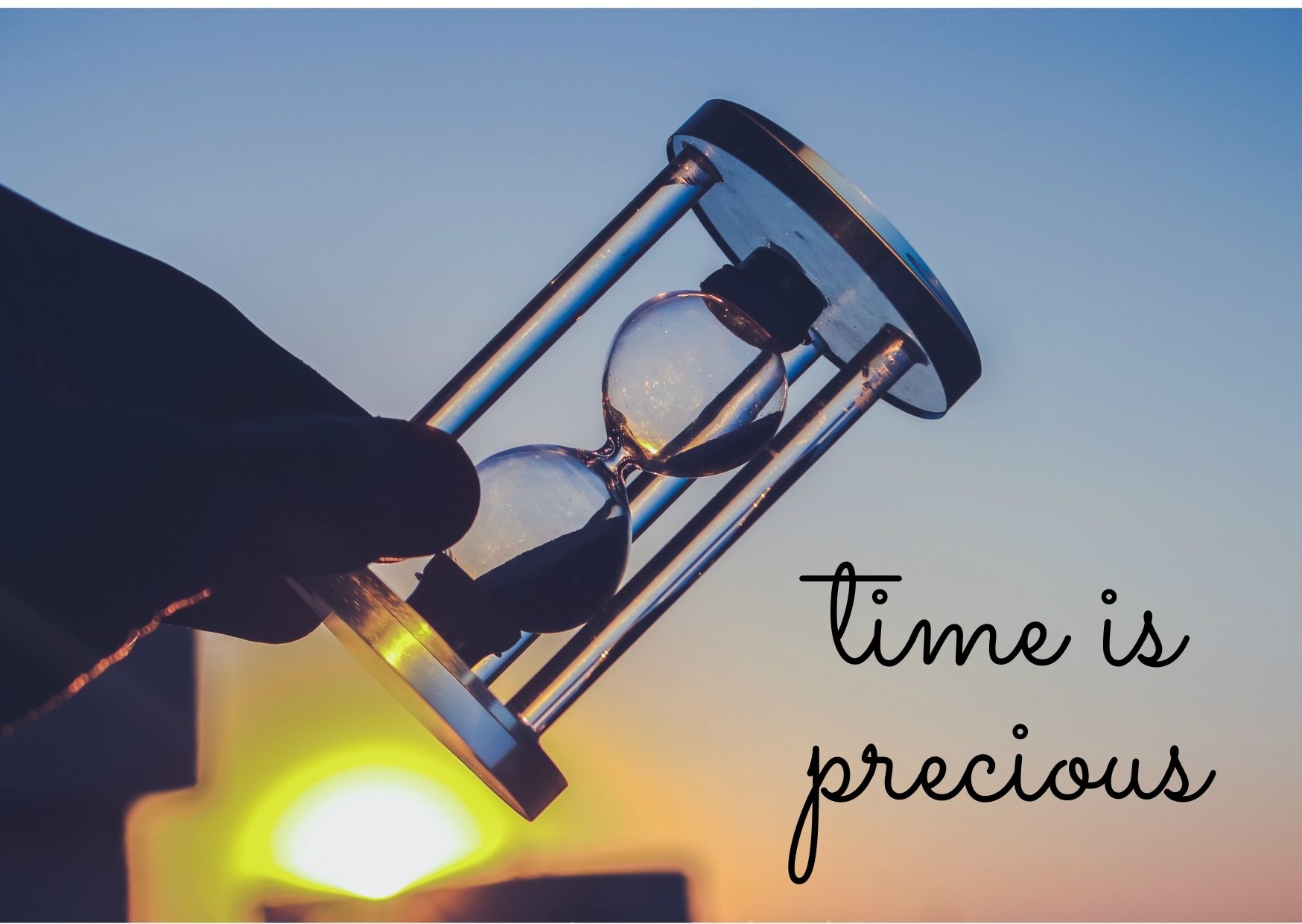 hourglass set to sunset background with 'time is precious' written on image